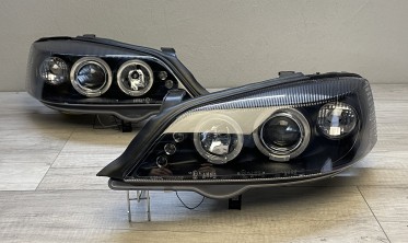 Чорні передні фари Opel Astra G з кільцями і діодами фото