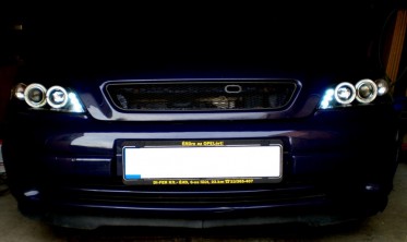Чорні передні фари Opel Astra G з кільцями і діодами фото