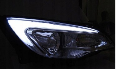 Тюнинговые фары передние Opel Astra J хромированные с DRL фото