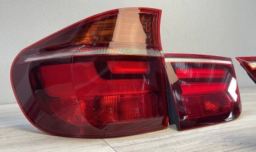 Тюнинговые фонари BMW X5 E70 дорестайл в стиле рестайлинг фото