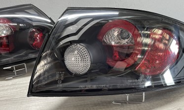 Тюнинговые задние фонари Audi TT 8N черные фото