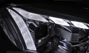 Передние фары линзованные VW Golf 7 тюнинг оптика с диодными поворотами фото