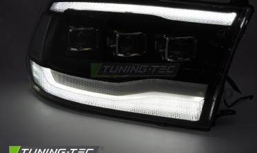 Черные передние тюнинговые фары Dodge Ram 1500 2009-2018 с функцией welcome lights фото