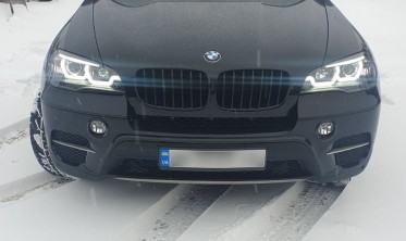 Тюнинговые фары передние BMW X5 E70 с 3D кольцами и ДХО фото