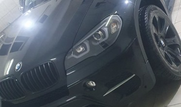 Тюнинговые фары передние BMW X5 E70 с 3D кольцами и ДХО фото
