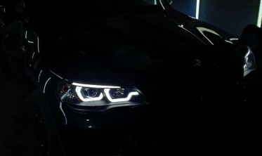 Тюнинговые фары передние BMW X5 E70 с 3D кольцами и ДХО фото