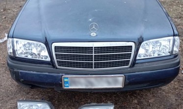 Тюнінгові фари передні Mercedes W202 C-class з прозорим склом фото