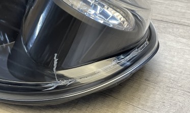Чорні тюнінгові задні ліхтарі Chrysler Voyager, Dodge Caravan з пошкодженням фото