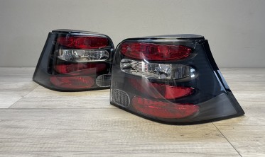Черные тюнинговые фонари задние VW Golf 4 хетчбек фото