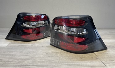 Чорні тюнінгові ліхтарі задні VW Golf 4 хетчбек фото