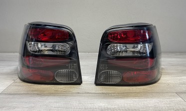 Черные тюнинговые фонари задние VW Golf 4 хетчбек фото