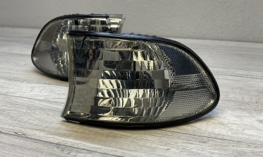 Повороты передние BMW E38 рестайлинг тонированные фото