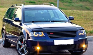 Тюнинговые фары VW Passat B5+ с кольцами Angel Eyes black фото