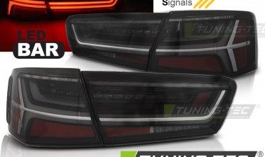Фонари задние светодиодные AUDI A6 С7 седан тонированные фото