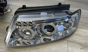 Фары передние VW Passat B5 тюнинговые с кольцами, хром фото