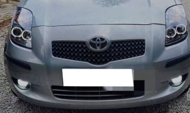 Линзованные черные фары передние TOYOTA YARIS 2 фото