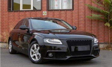 Передние фары AUDI A4 B8 дорестайл черные с линзами и функцией ДХО фото
