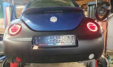 Тоновані ліхтарі задні діодні VW NEW BEETLE з динамічними поворотами фото