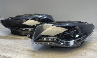 Черные тюниговые фары передние VW Passat CC дорестайл фото