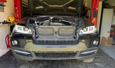 Тюнинговые фары передние BMW X5 E70 с 3D кольцами и ДХО фото