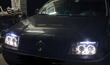 Фары передние тюнинговые VW Bora черные с кольцами фото