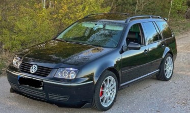 Фары передние тюнинговые VW Bora черные с кольцами фото