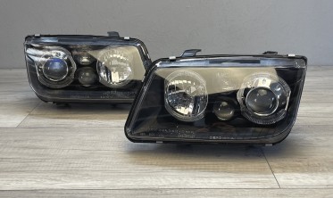 Чорні передні фари з лінзами VW Bora з кільцями Angel Eyes фото