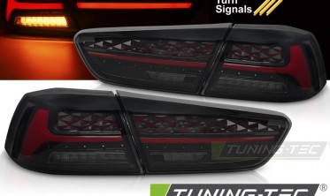 Задні ліхтарі Mitsubishi Lancer 10 тоновані стопи welcome lights фото