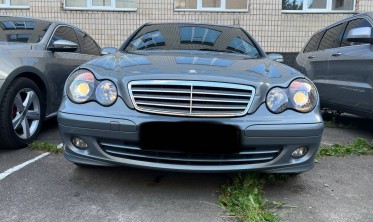 Тюнинговые фары передние с линзами Mercedes W203 черные фото