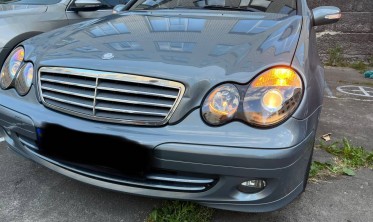 Тюнинговые фары передние с линзами Mercedes W203 черные фото