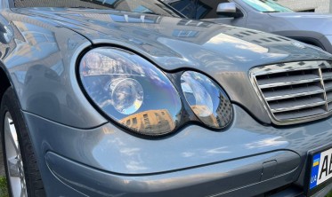Тюнинговые фары передние с линзами Mercedes W203 черные фото