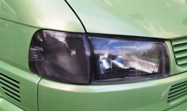 Передні галогенові фари VW T4 рест. 1996-2003 чорні без поворотів фото