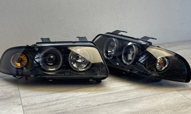 Чорні фари передні Audi A4 B5 дорестайл з габаритами-кільцями фото