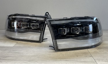 Чорні передні тюнінг фари Dodge Ram 1500 2009-2018 з функцією welcome lights фото