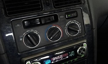 Декоративні кільця на ручки пічки Toyota Avensis T22 фото