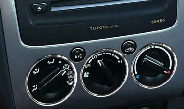 Хромированные кольца на ручки климат контроля Toyota Avensis T22 фото