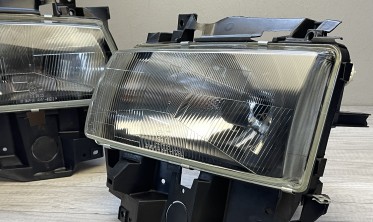Передні галогенові фари VW T4 рест. 1996-2003 чорні без поворотів фото