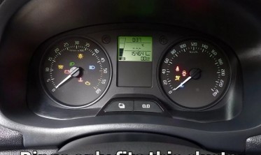 Хромовані кільця для декору панелі приладів Skoda Rapid фото