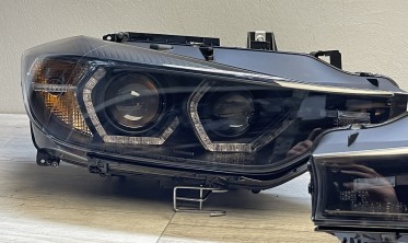 Чорні фари передні BMW F30/F31 дорестайл з жовтими кільцями фото