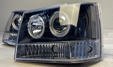 Чорні фари передні JEEP Grand Cherokee ZJ з кільцями на габарит фото