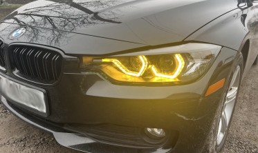 Чорні фари передні BMW F30/F31 дорестайл з жовтими кільцями фото