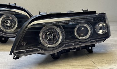 Передні фари з лінзами та кільцями BMW X5 E53 дорестайл фото