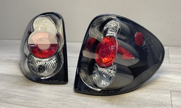 Черные задние фонари Chrysler Voyager, Dodge Caravan фото