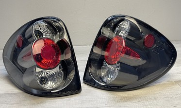 Черные задние фонари Chrysler Voyager, Dodge Caravan фото
