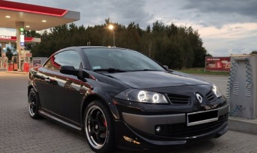 Чорні передні фари Renault Megane 2 з габаритами-кільцями фото