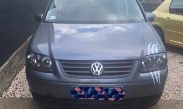 Передні фари з чорним корпусом VW Touran дорестайл, Caddy фото