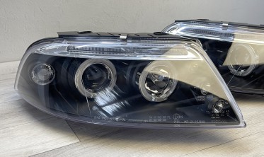 Фары передние VW Passat B5 3BG черные с кольцами фото