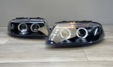 Фары передние VW Passat B5 3BG черные с кольцами фото
