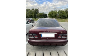 Тюнінгові ліхтарі задні Mercedes W210 тоновані фото