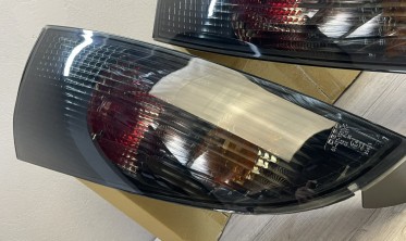 Фонари задние Ford Focus 1 hatchback тонированные фото